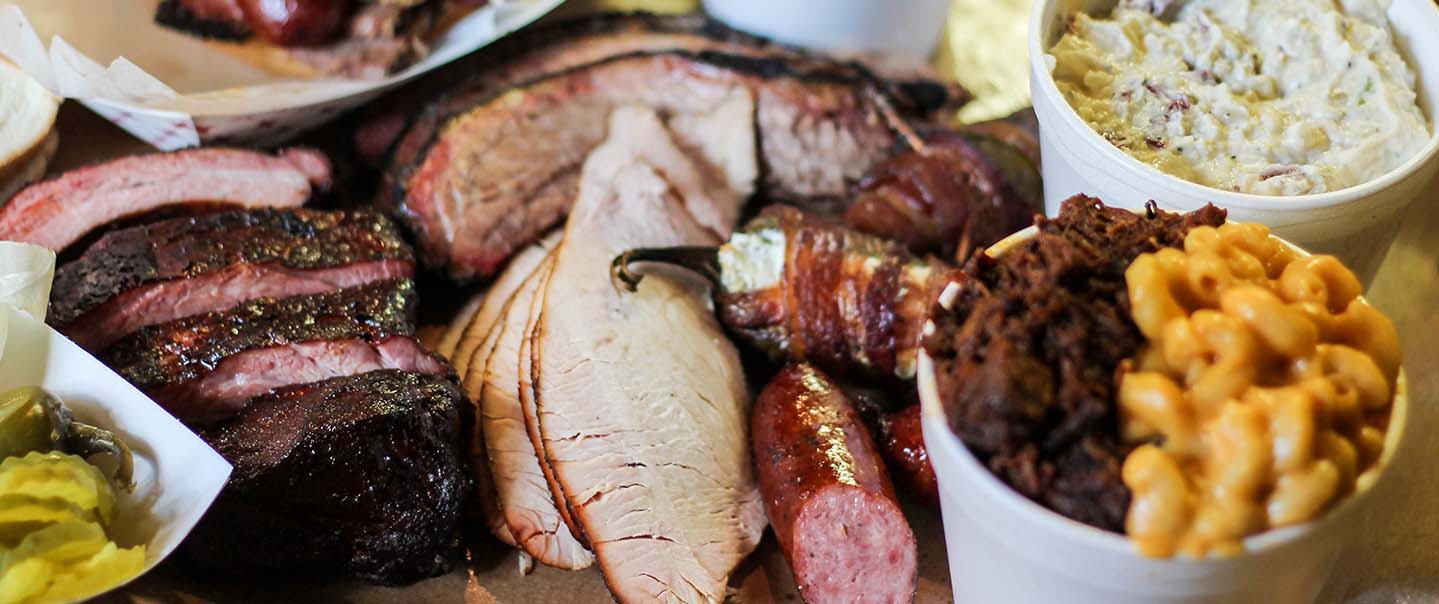Two Bros BBQ Market signature dishes Smoked Sliced Beef Brisket
Cherry-Glazed Baby Back Ribs
Mac and Cheese